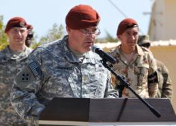 Sgt. Thomas Duval Maj. Gabe Simonds, commander for 1st Squadron, 112th Cavalry Regiment addresses an audience during a Transfer of Authority Ceremony held on the Multinational Force and Observer's South Camp in Sharm el-Sheikh, Egypt Feb. 19, 2015. The 1-112th Soldiers relinquished command of the U.S. Security Battalion to Soldiers from the 4th Squadron, 3rd Cavalry Regiment.